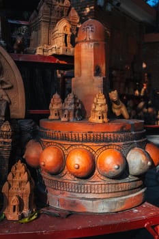 Clay figurines and statues of lingam in a souvenir shop in Vietnam in Asia