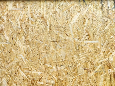Detailed view of oriented strand board showcasing its unique texture and pattern.
