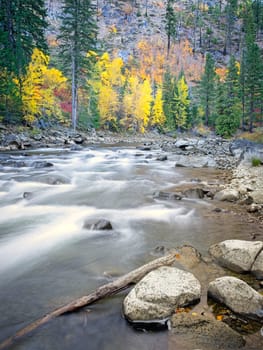 The rapids in the Tumwater Canyon area of the Wenatchee river in autumn near Leavenworth, Washington.