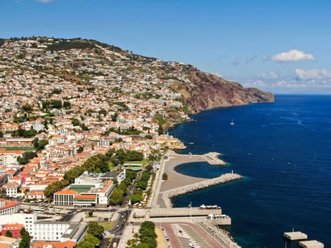 Panoramic view of the picturesque coast of Funchal on a sunny day on the island of Madeira, Portugal. High quality photo