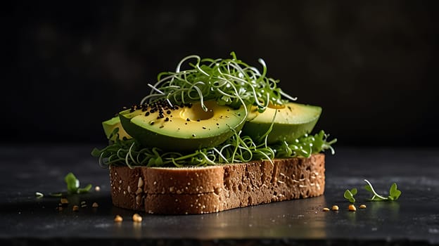 A close-up shot of a delicious avocado toast topped with fresh microgreens and black pepper. The toast is made with whole grain bread and the avocado is ripe and creamy. The microgreens add a burst of flavor and texture, making this a perfect healthy and satisfying snack or light meal. This image is ideal for use in food blogs, cookbooks, or any publication that features healthy recipes, vegetarian dishes, or gourmet food. It can also be used for social media posts promoting healthy eating or food photography. ,