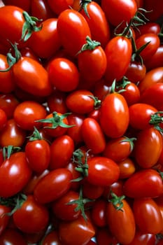 Large number of red beautiful and ripe tomatoes.