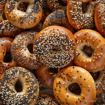 A stack of baked goods topped with a mix of sesame seeds and poppy seeds, perfect for a sweet and savory finger food option
