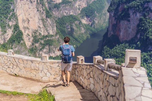 Female tourist exploring Sumidero Canyon National Park, Mexico. Adventure, natural exploration, and travel experience concept.