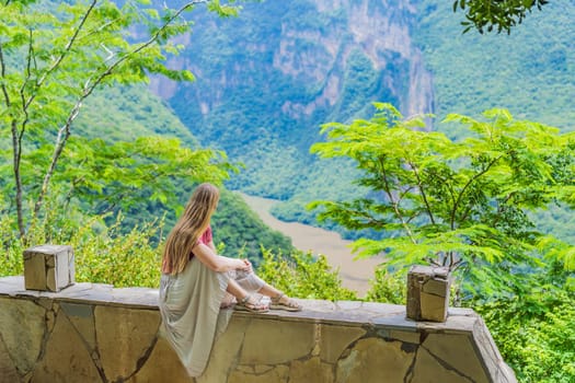 Female tourist exploring Sumidero Canyon National Park, Mexico. Adventure, natural exploration, and travel experience concept.