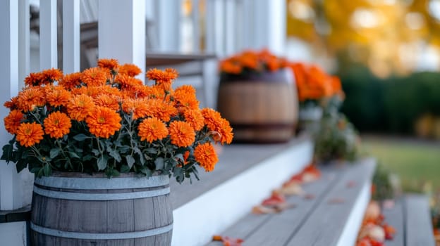 Decorating the porch and front door with pumpkins and fall flowers. Decorating the house for the traditional holiday. High quality photo