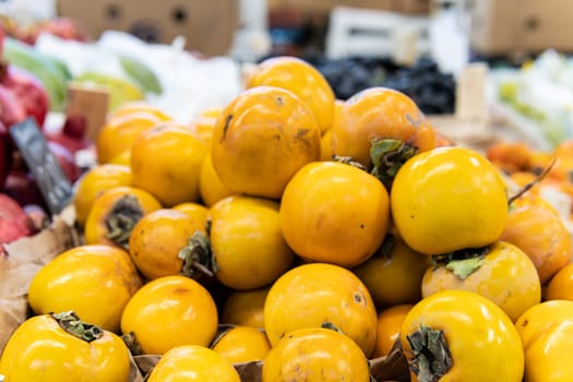 food persimmon harvest organic market health vegetarian green fruit fresh vegetable juicy raw