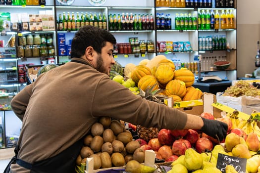 organic groceries food shopping people vegetable selling buying seller market man vegan caucasian