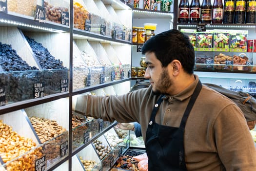 selling organic shopping seller market people man groceries food caucasian vegetable buying vegan