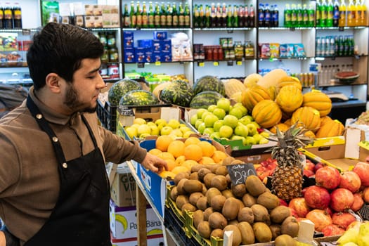 vegan buying man caucasian people food selling shopping organic market seller groceries vegetable