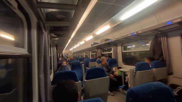 October 23 2024 Prague city Czech Republic Europe, window and interior of a passenger train, transport, movement, industry, people, travel . High quality editorial photo