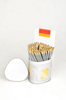 Neatly arranged set of pencils with dotted grips housed in a sleek metal canister, with isolated white background Ideal for artists, students, or office use, The design complements both functionality and aesthetics good for digital content creation and back to school