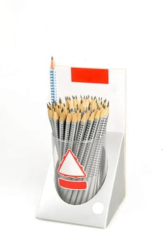Neatly arranged set of pencils with dotted grips housed in a sleek metal canister, with isolated white background Ideal for artists, students, or office use, The design complements both functionality and aesthetics good for digital content creation and back to school