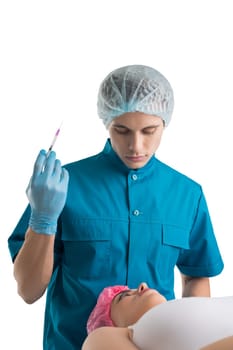 Plastic surgeon making injection to a woman isolated shot on white background