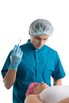 Surgeon giving lip beauty injections to a girl isolated shot on white background