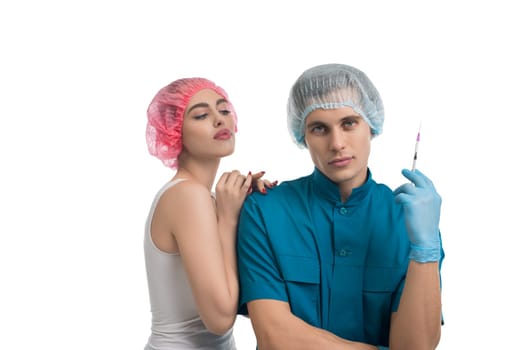 Plastic surgeon with his female pretty patient isolated portrait on white background