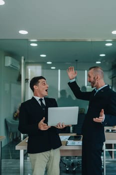 Give me five. managers employees join hands high celebrate common achievement. Two young men successful teammates friends greet each other with great job result.