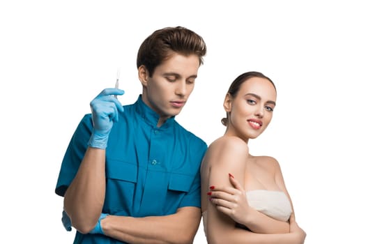 Handsome plastic surgeon with a beautiful girl isolated portrait on white background
