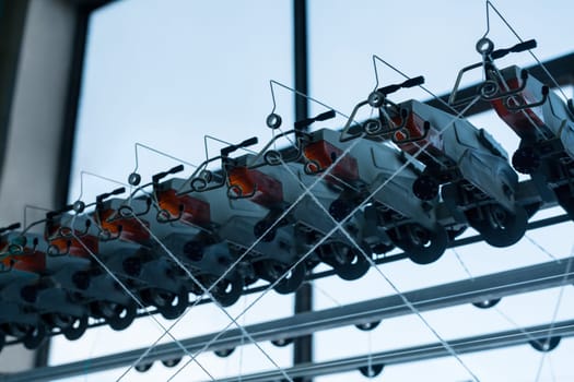 Automatic rewinding machine equipment at a knitting factory view