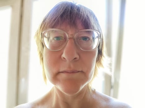 A woman with a noticeable bruise and swollen cheek appears distressed, reflecting the impact of domestic violence and dental pain.