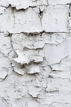 Peeling white paint on weathered wall, ideal for abstract architecture backgrounds