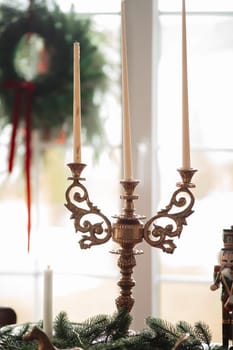 Beautiful Christmas decor. Decorating a room on a holiday. Stylish details.