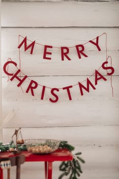 Beautiful Christmas decor. Decorating a room on a holiday. Stylish details.