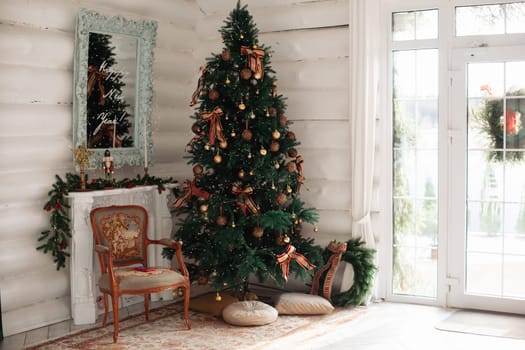 Stylish Christmas tree, New Year's interior, beautiful decor in the house.