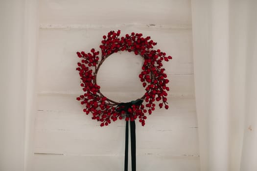 Beautiful Christmas decor. Decorating a room on a holiday. Stylish details.