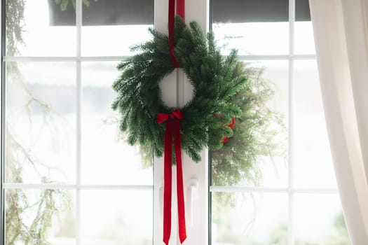 Beautiful Christmas decor. Decorating a room on a holiday. Stylish details.