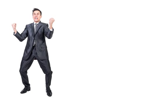 Full body of angry male entrepreneur in classy suit shouting and making face on white background