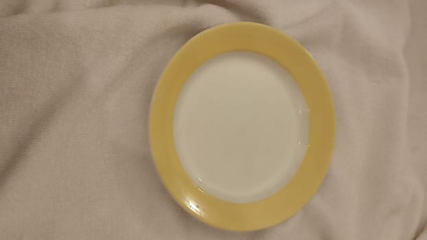 yellow white round plate ceramics object homeware, kitchen . High quality photo