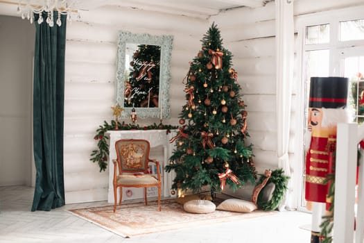 Stylish Christmas tree, New Year's interior, beautiful decor in the house.