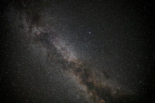 A breathtaking capture of the starry night sky featuring the Milky Way. Perfect for conveying wonder, infinity, and the beauty of the universe.