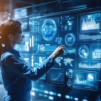Businesswoman is touching a large interactive screen displaying financial data visualization in a dark room
