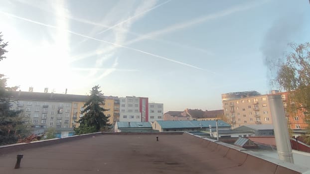 City day landscape, town building architecture background photo,pipe smoke, blue sky fall,October 22 2024 Hradec Kralove, Czech Republic Europe, Kralov region. High quality photo