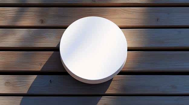 Round white empty signboard is hanging on a wooden wall with sunlight, creating a cozy and inviting atmosphere