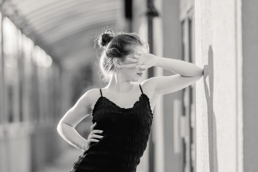 Portrait Captures Young Girl In Fashion Style Dress On Street In Black And White