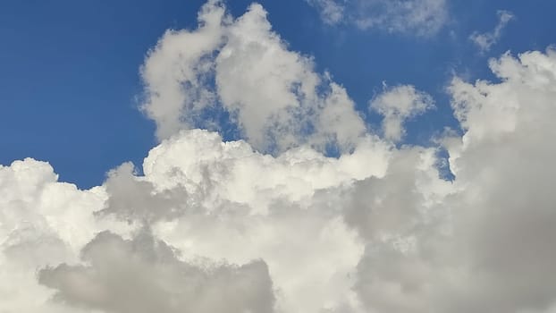 blue sky white clouds background nature air atmosphere weather, round sin light. High quality photo