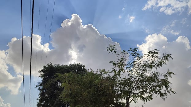 blue sky white clouds background nature air atmosphere weather, round sin light. High quality photo