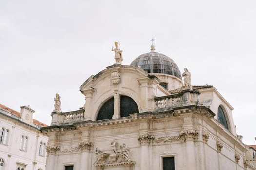 Statues on the roof of the Church of St. Blaise. Dubrovnik, Croatia. High quality photo