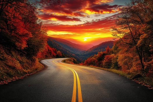 Winding road curves through scenic autumn foliage trees on sunset background..