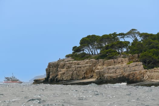 Marseille, France - June 9, 2024 : Calanque of En-Vau on the Coast of Provence, Calanques National Park seen from an excursion boat cruising, High quality 4k footage