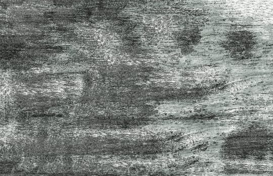 Background grunge texture with spots and raised particles on the surface in close-up