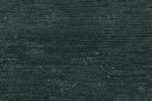 Background texture of a dark gray uneven background with horizontal stripes and light spots