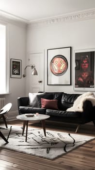 Modern living room with black sofa, art decor, white walls and wooden floor