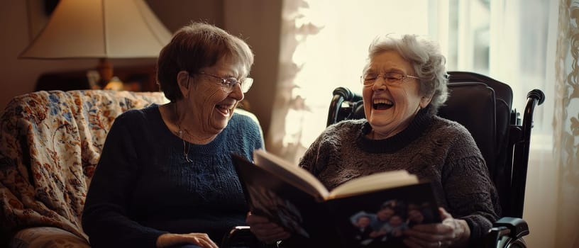 Two joyful senior women in wheelchairs share a lighthearted moment, laughing together while reminiscing over a cherished book, showcasing friendship and happiness.