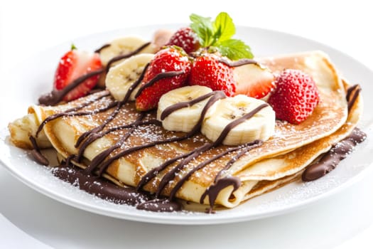 Hot appetizing pancakes on a plate, decorated with chocolate and slices of strawberry and banana. High quality photo