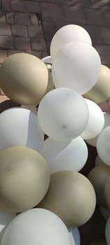 gold and white round balloons objects toys holiday. High quality photo