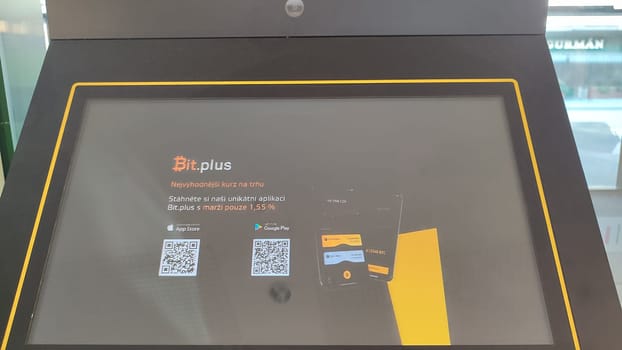 October 22 2024 Hradec Kralove, Czech Republic Europe, Kralov region, Kralovehradecky kraj, a machine in a supermarket exchanging bitcoins for crowns. High quality photo